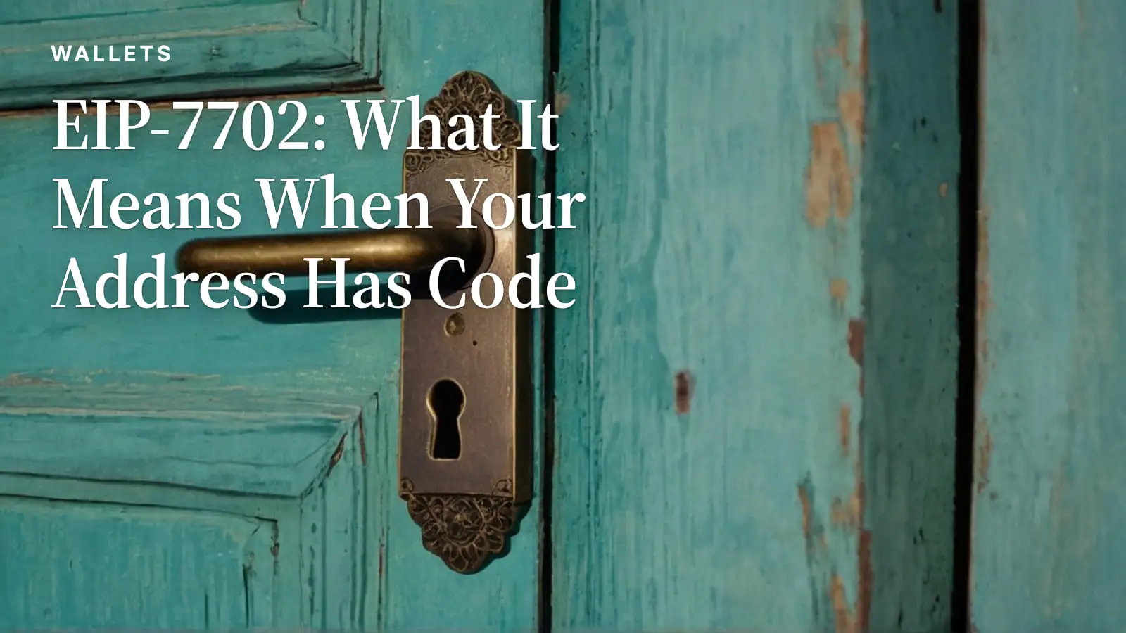 An aged brass lock plate and handle on a weathered turquoise wooden door.